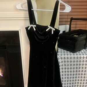 Elegant Black Dress with Bow Accents